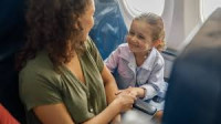 How much does Spirit charge for unaccompanied minors?